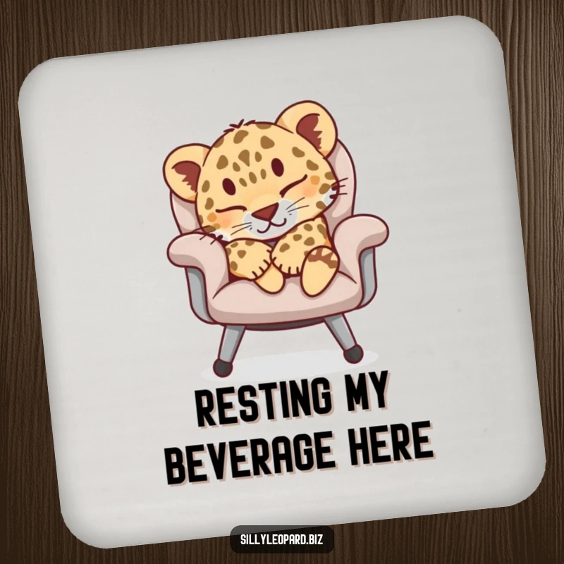 Funny drink coaster depicting a content leopard cub napping on an office chair, offering surface protection with a humorous design.